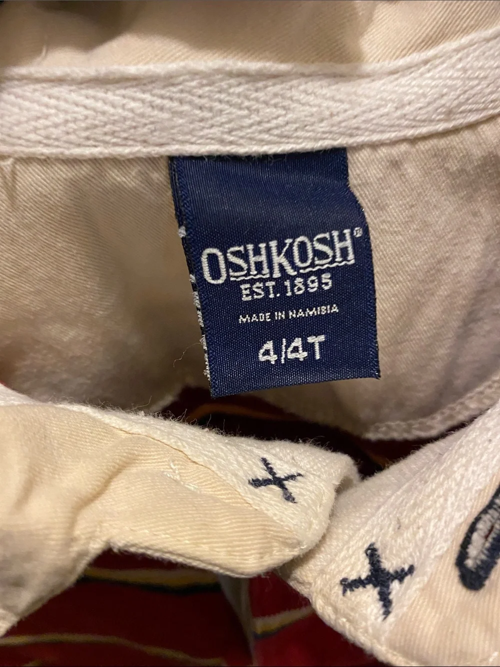C) OshKosh Red Striped Long Sleeve Polo with Cream Collar. 4T